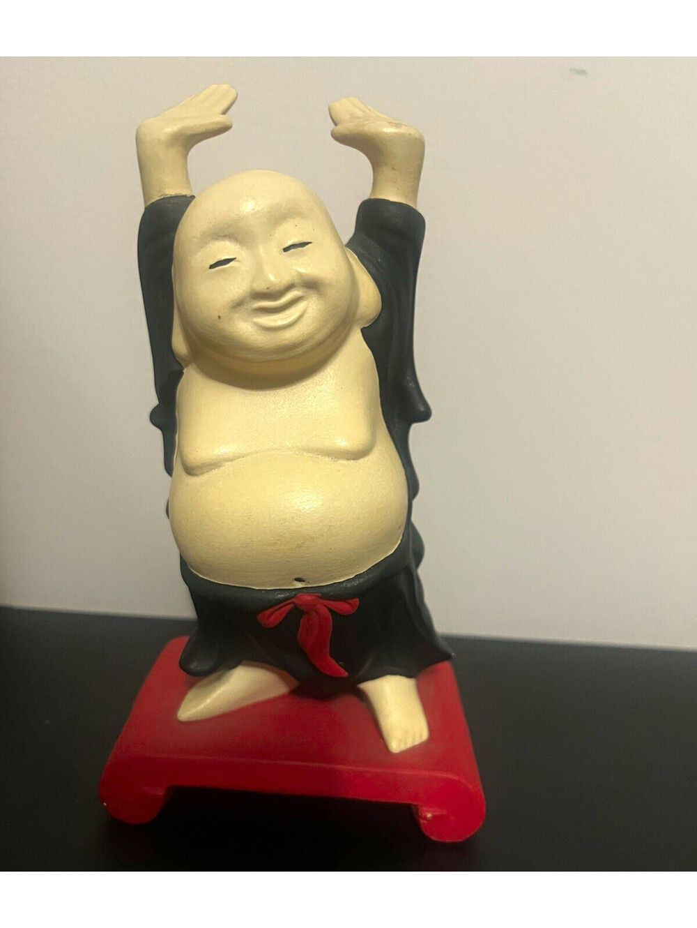 Laughing Buddha Ceramic Figurine Hand Painted Matte Multicolor Red Base 104